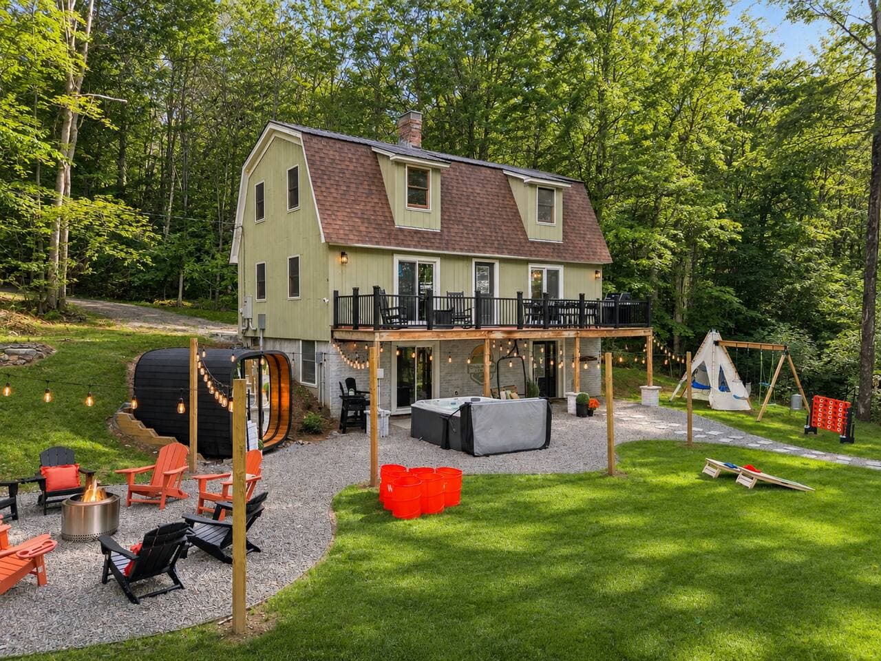 Front lawn and exterior of the five-bedroom mountain home in Intervale, NH